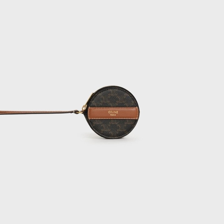 以深色Triomphe Canvas和棕褐色小羊皮製成的Coin Purse