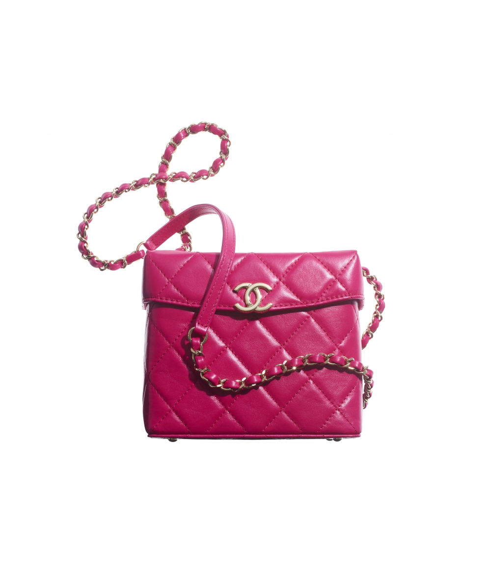 手袋款式如像盒般的外型,充滿時尚感的立方設計,備有桃紅色與黑色調以供選擇。