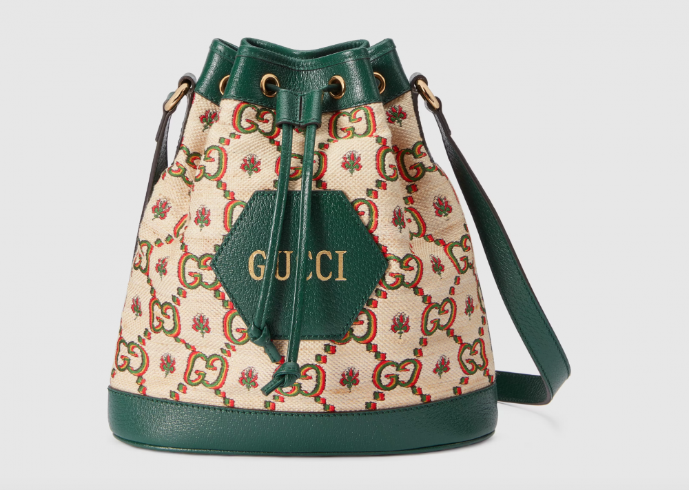 有著特別為Gucci 100年所設計的圖騰的手袋,特別耀眼