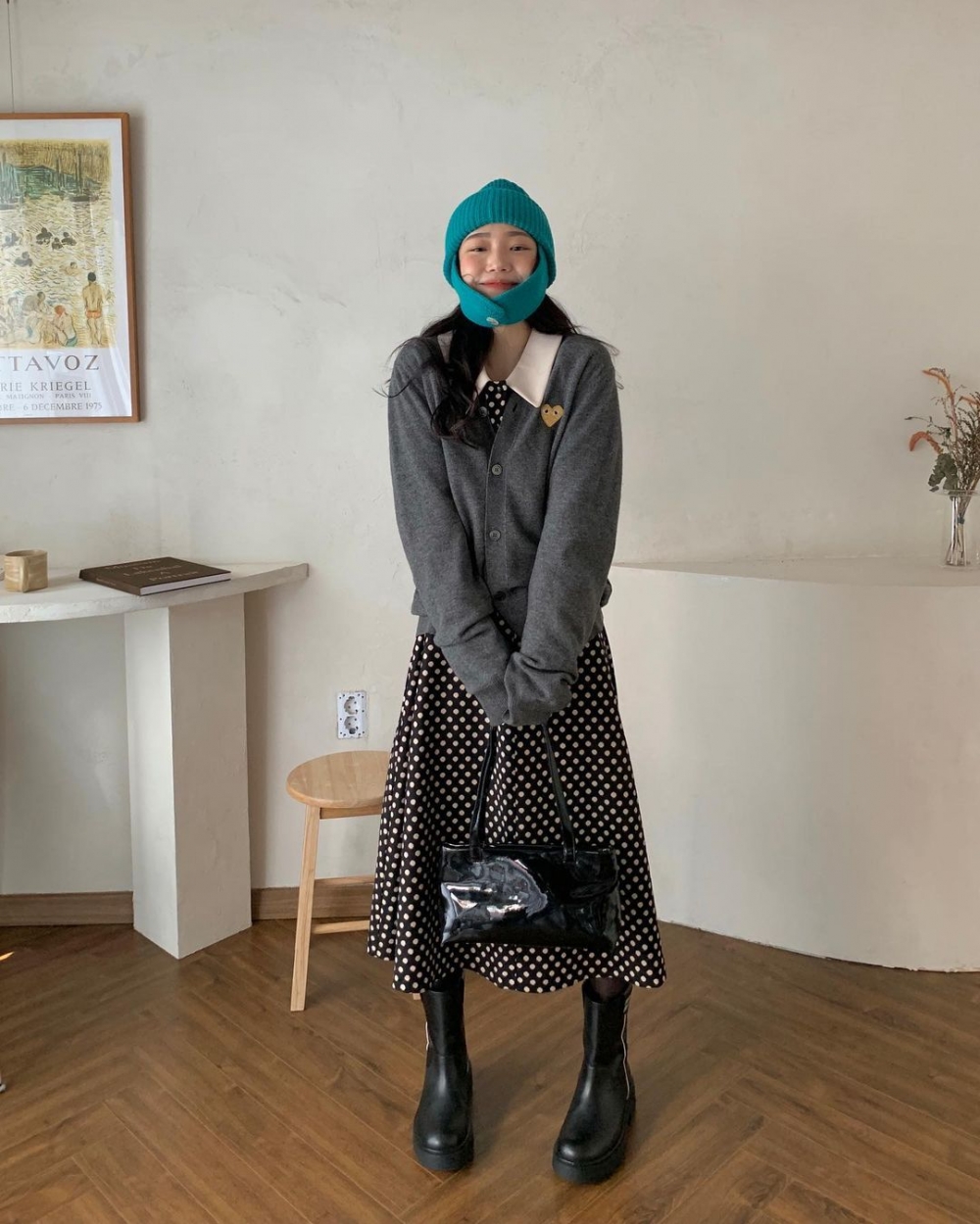 中短裙搭配長筒靴,成熟派女生會喜歡的知性