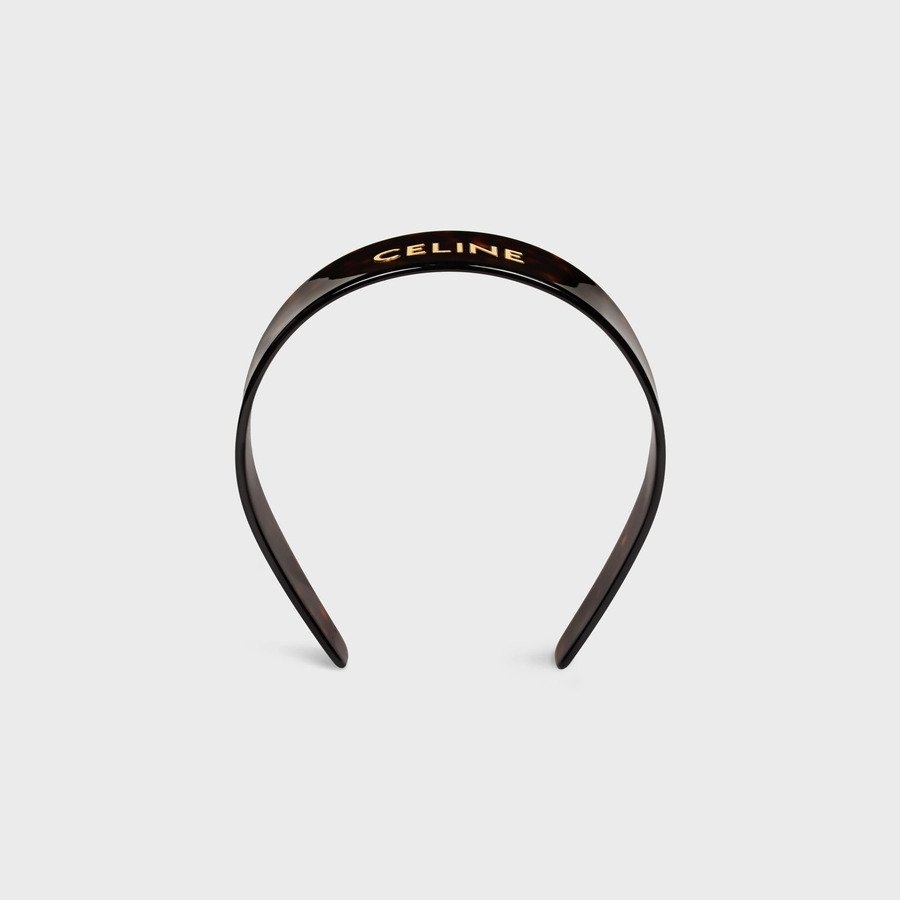 CELINE Headband將一身簡約服裝注入別緻感。