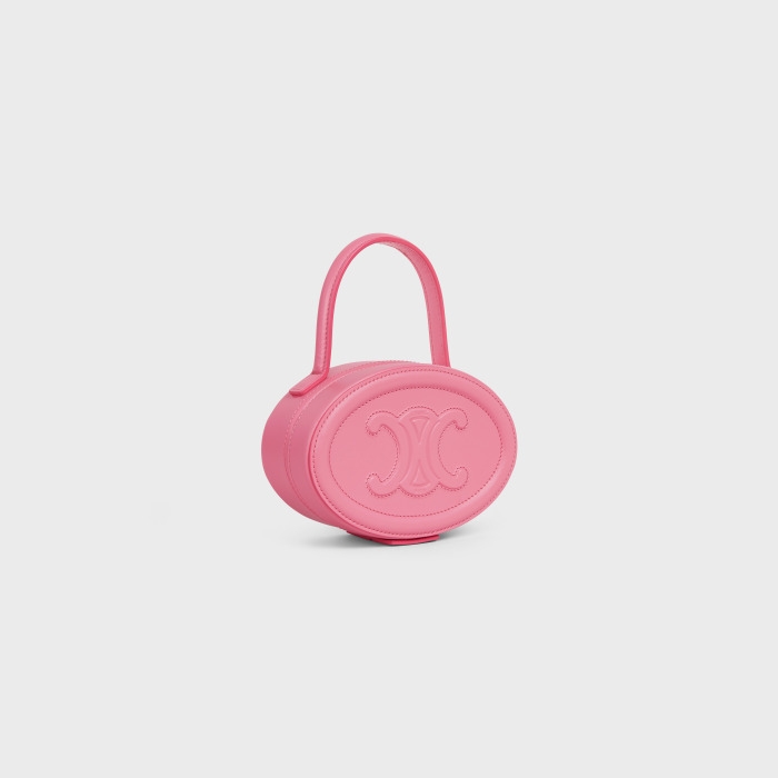 CELINE Cuir Triomphe光滑牛皮革橢圓形化妝包,新年限定豔粉配色。