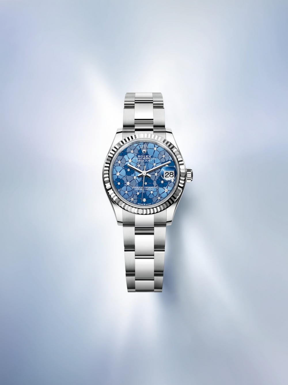 這款Oyster Perpetual Datejust 31將浪漫的夏日草甸都收納在錶面。