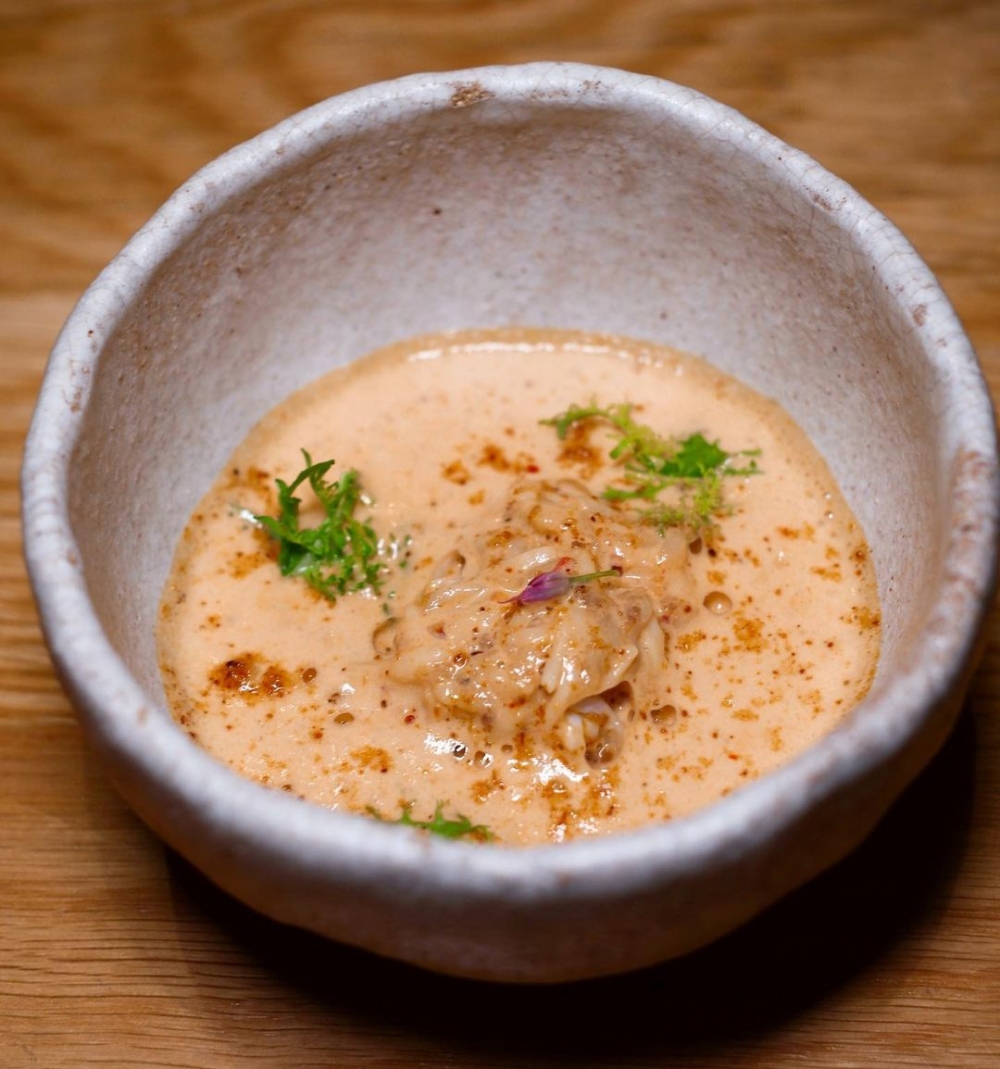 Chili King crab, blue ginger custard.