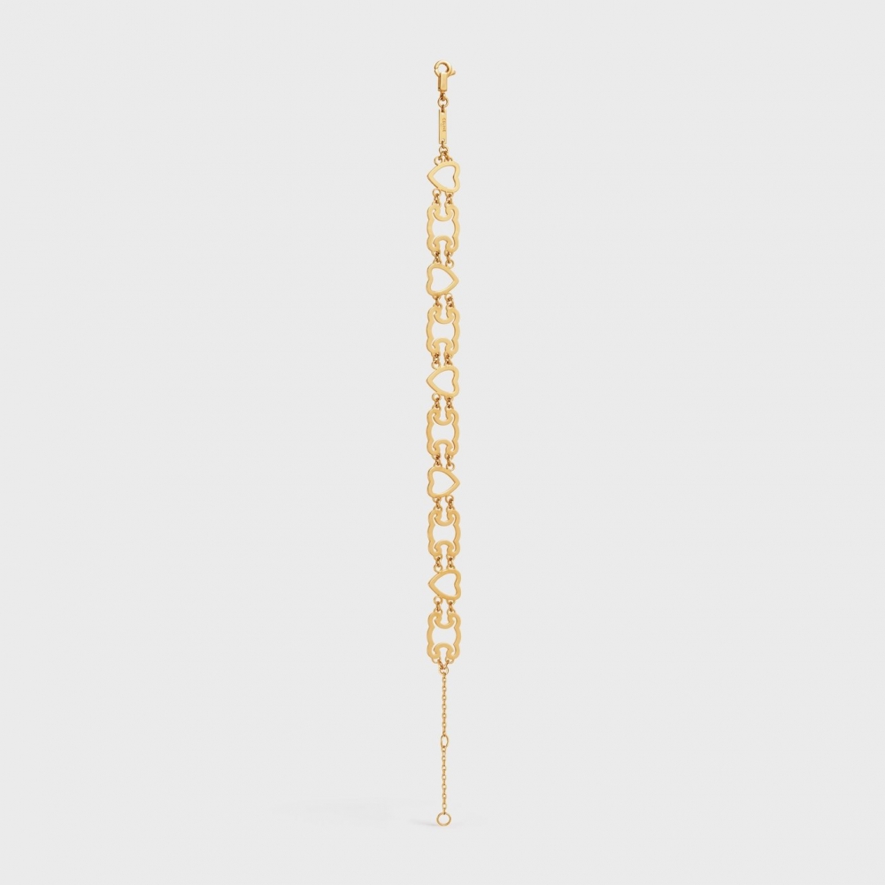 這款Triomphe Heart and Triomphe Bracelet in Brass with Gold Finish Gold也十分迷人。