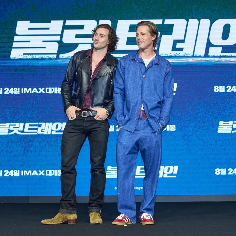 Brad Pitt與演員Aaron Taylor Johnson一。