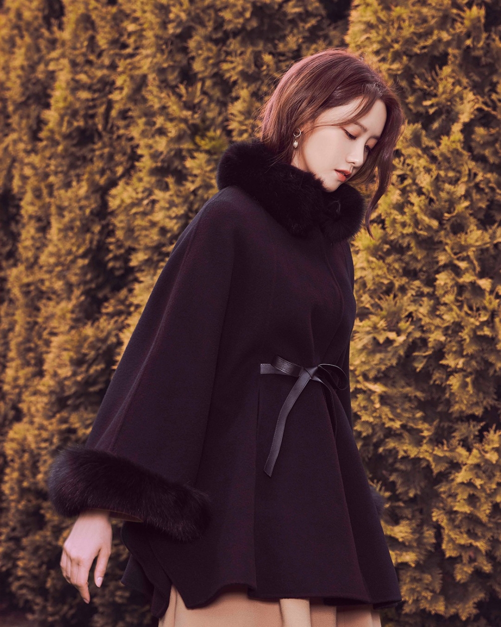 她穿上後多了一種嬌柔感。