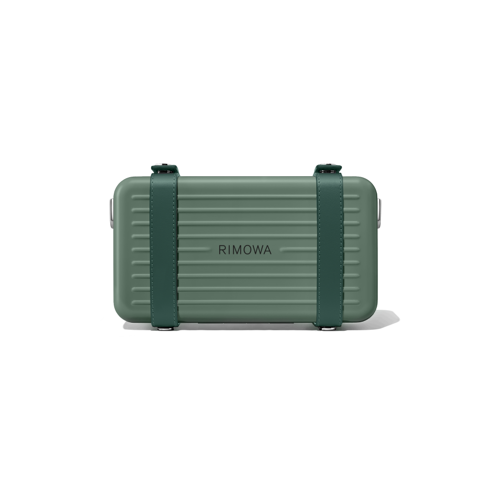 松綠色的斜揹袋。