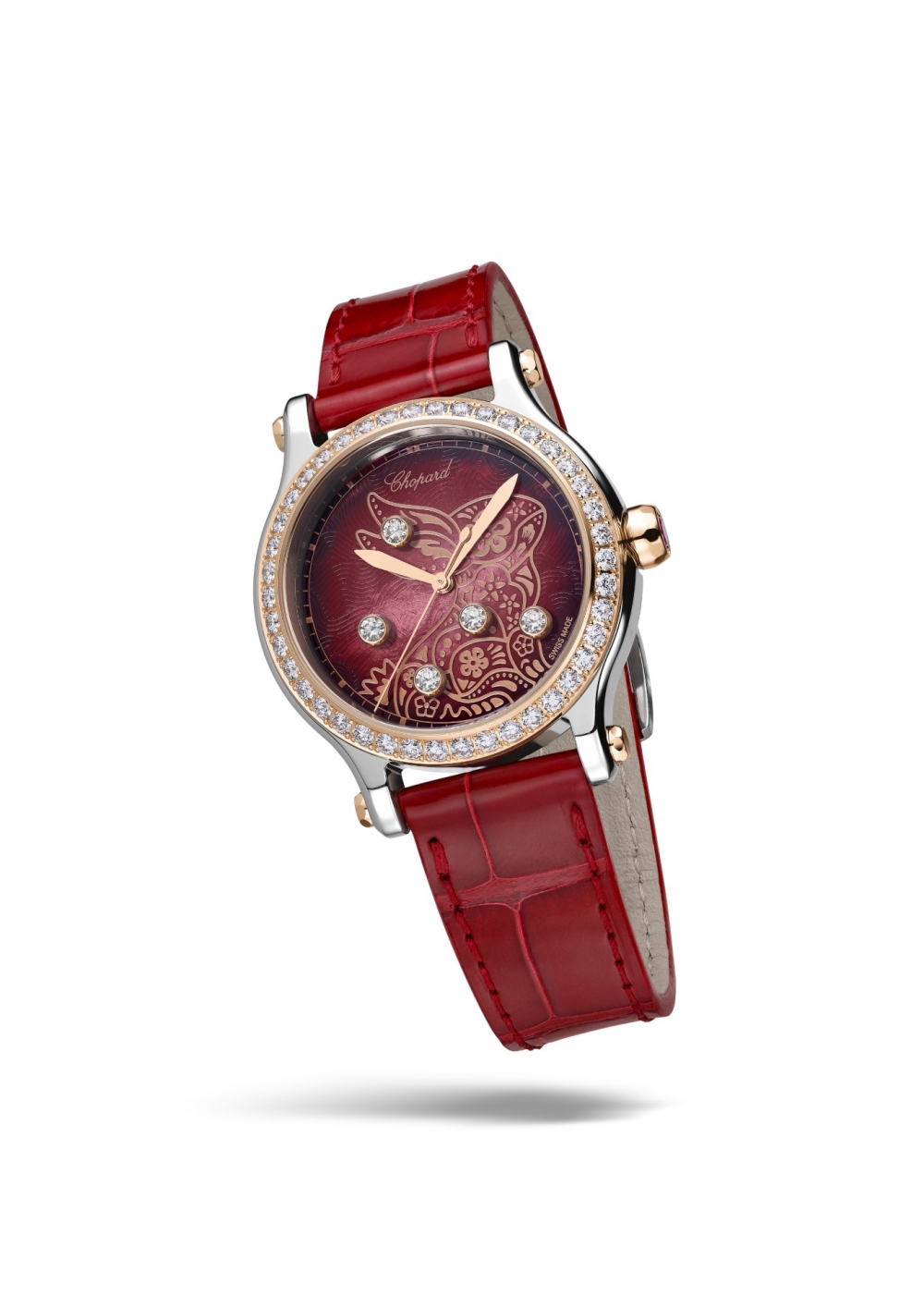 五顆靈動鑽石圍繞裝以金色細絲勾勒而成的兔子