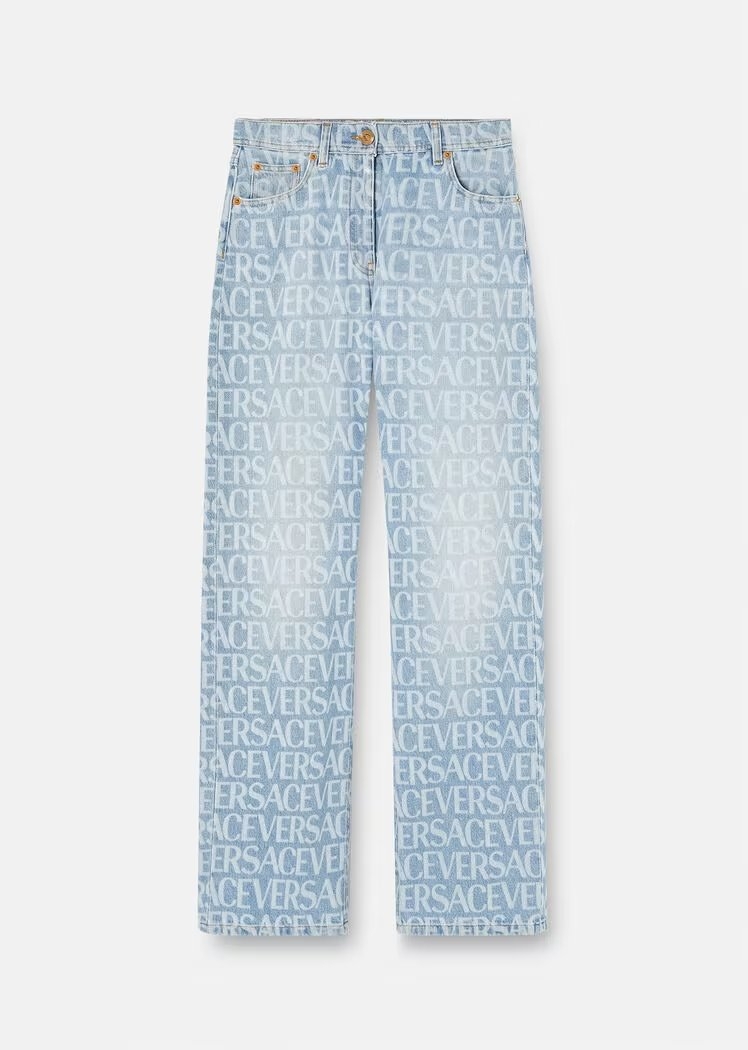 淺色的Versace Allover Wide-Leg Jeans。