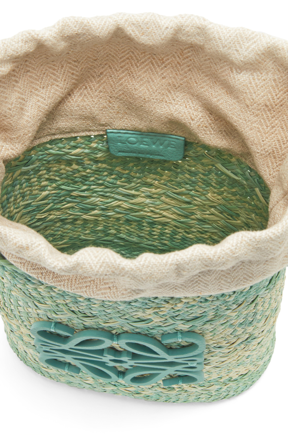 附有皮革肩帶和人字紋抽繩頂部棉帆布