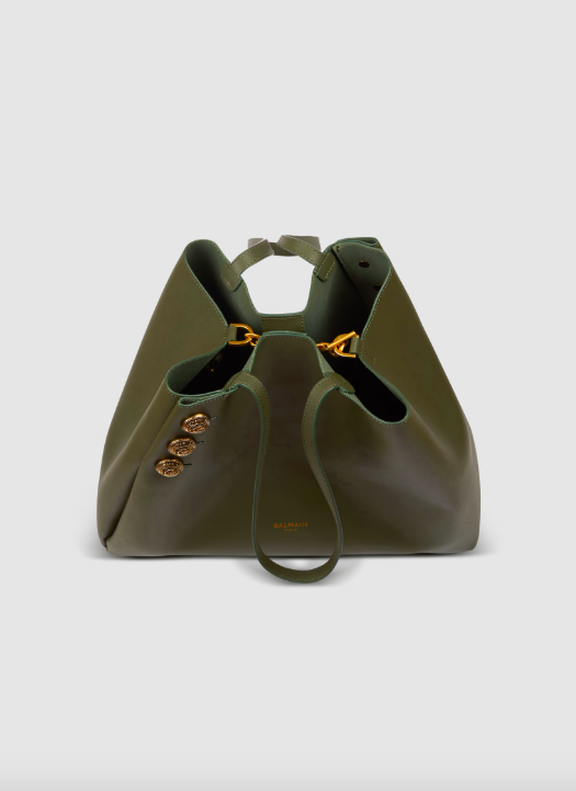 可以將兩邊的袋身勾在一起。