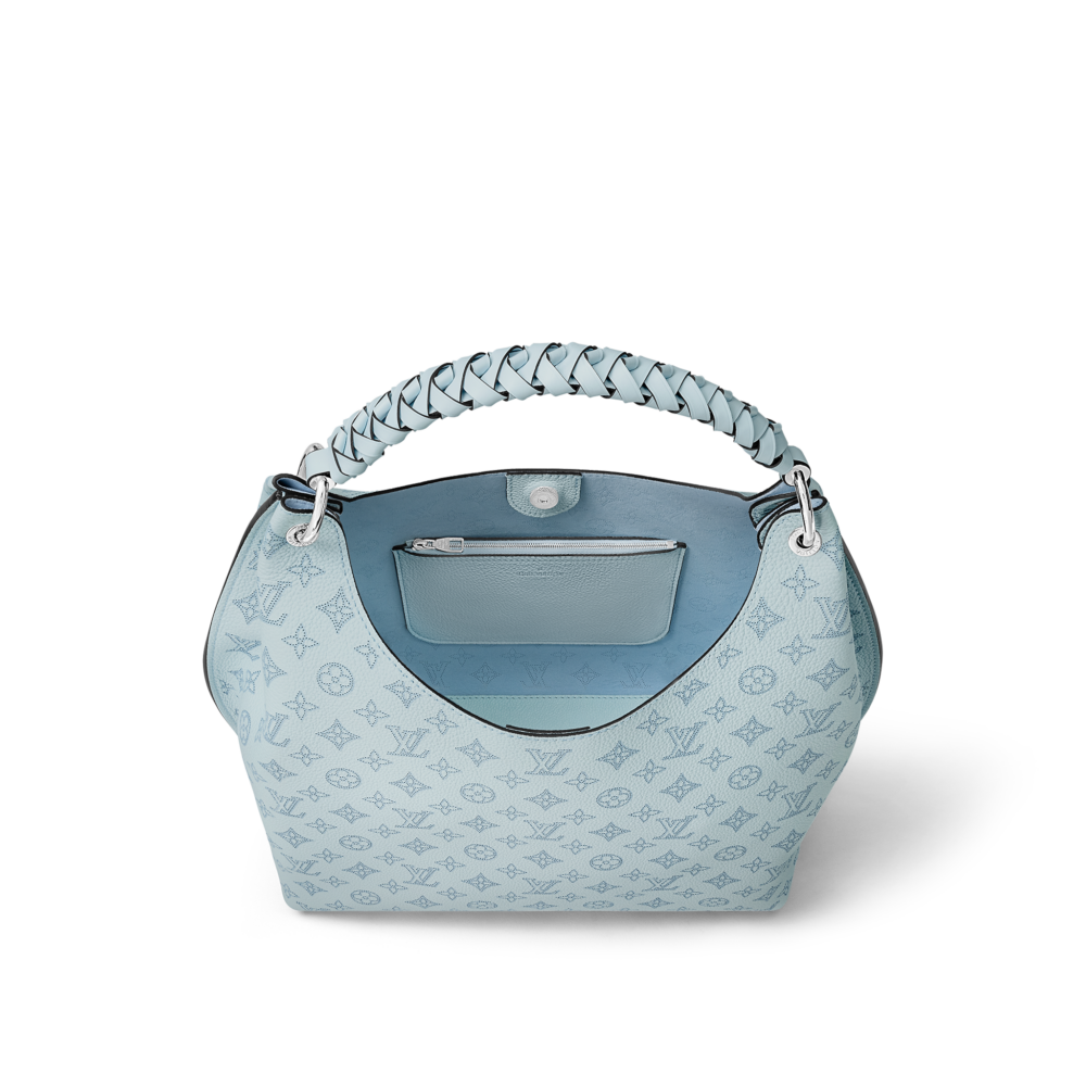 內裡附有2個隔層、內部拉鍊平袋