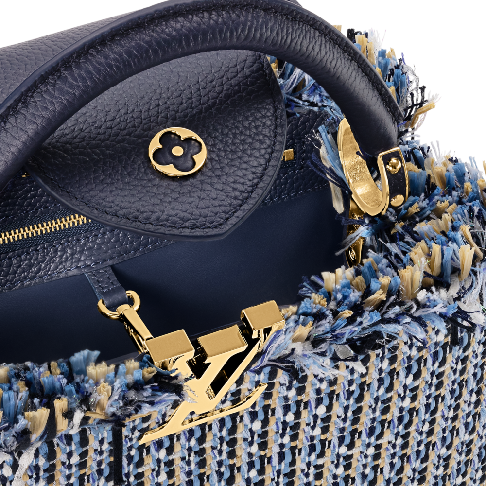 在手袋的翻蓋上大方展示精美的Monogram花朵圖案