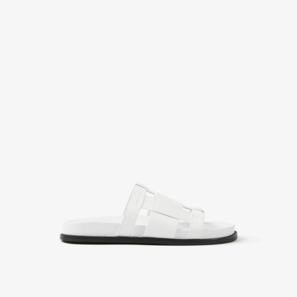 Burberry Woven Leather Slides。