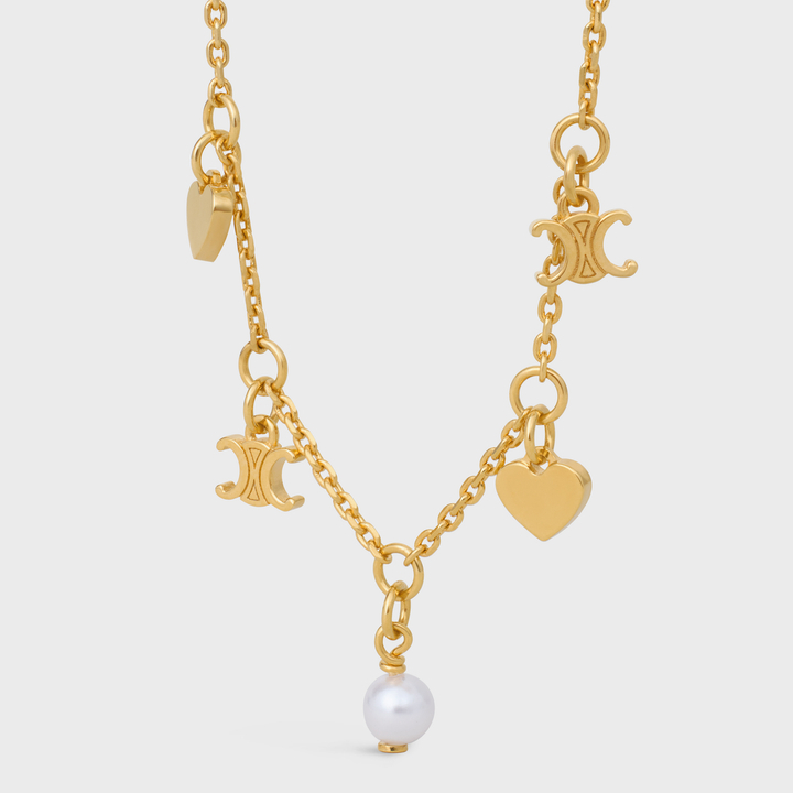 鐫刻有CELINE PARIS標誌以及樹脂珍珠