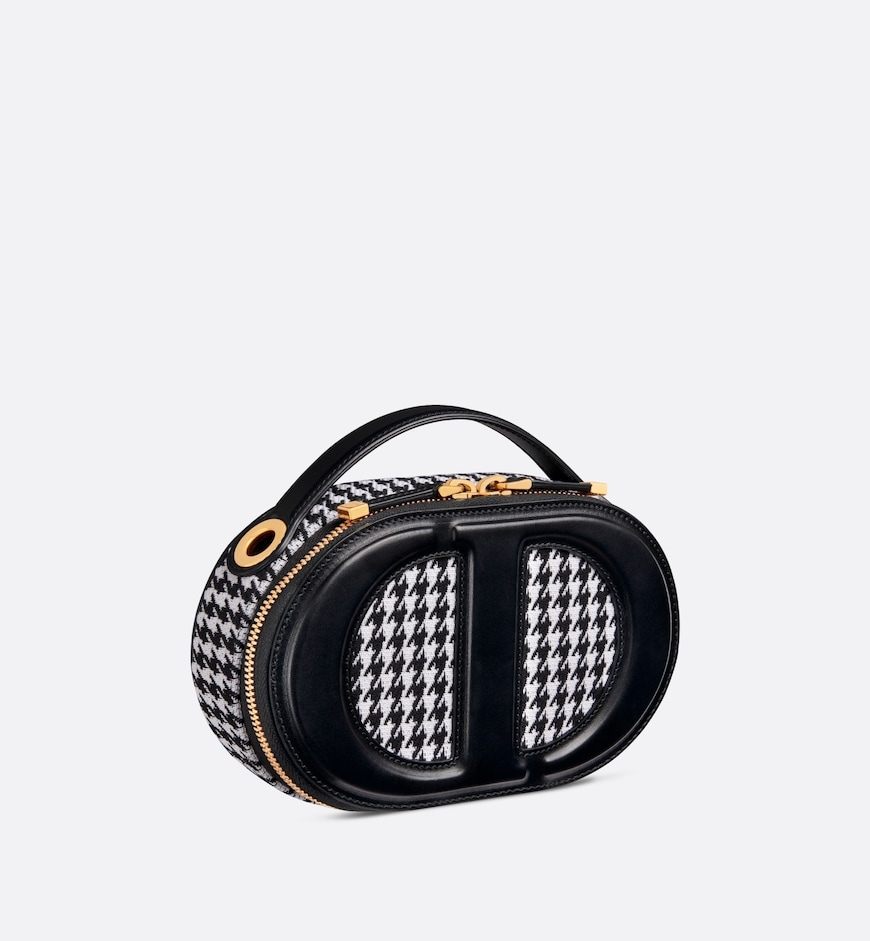 採用黑白千鳥格刺繡棉質面料精製而成