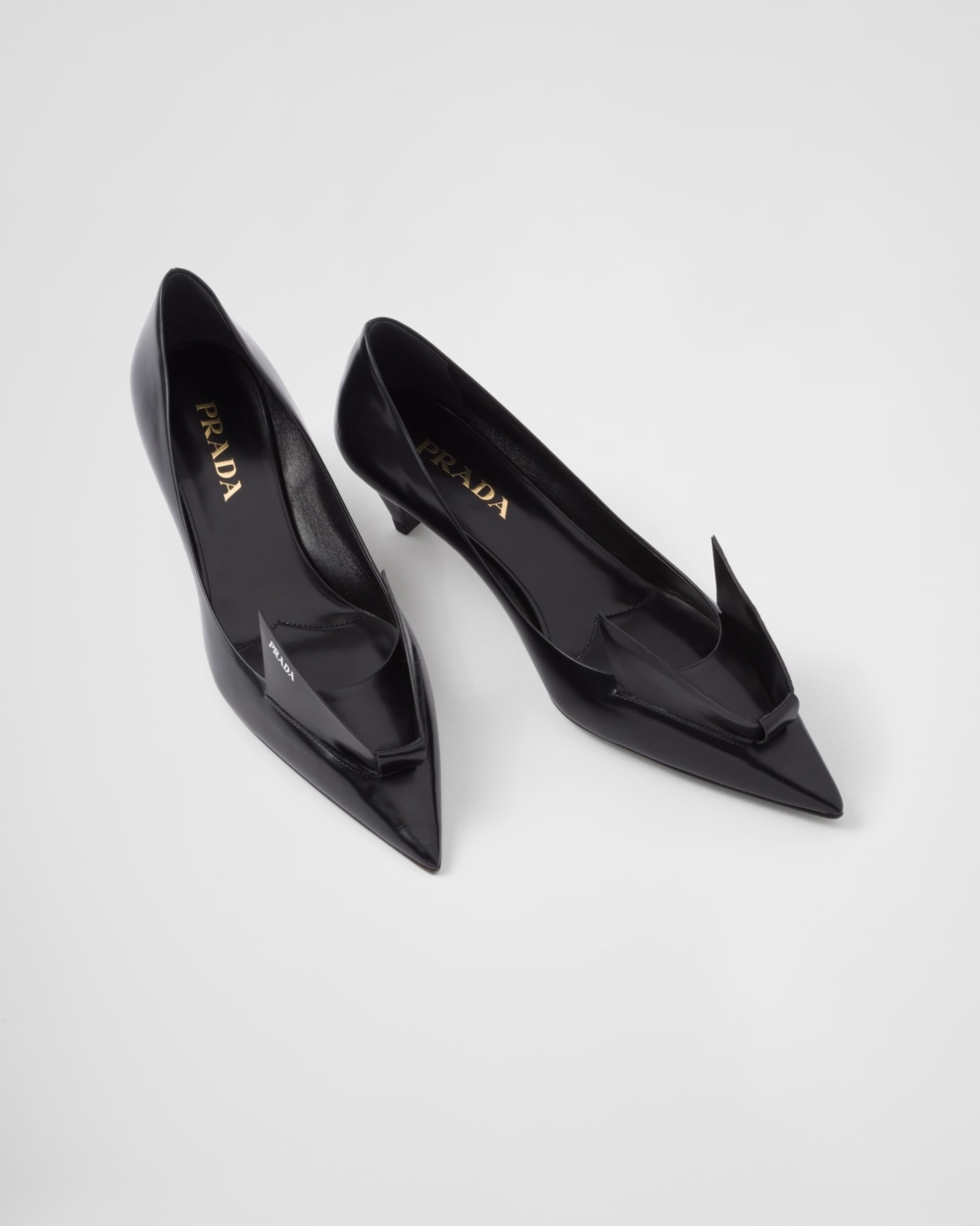 Brushed Leather Pumps。