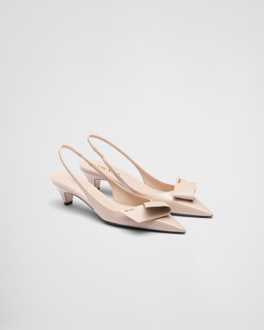 Brushed Leather Slingback Pumps。