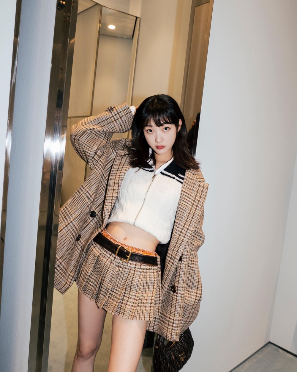同色調的格紋套裝帶有復古格調