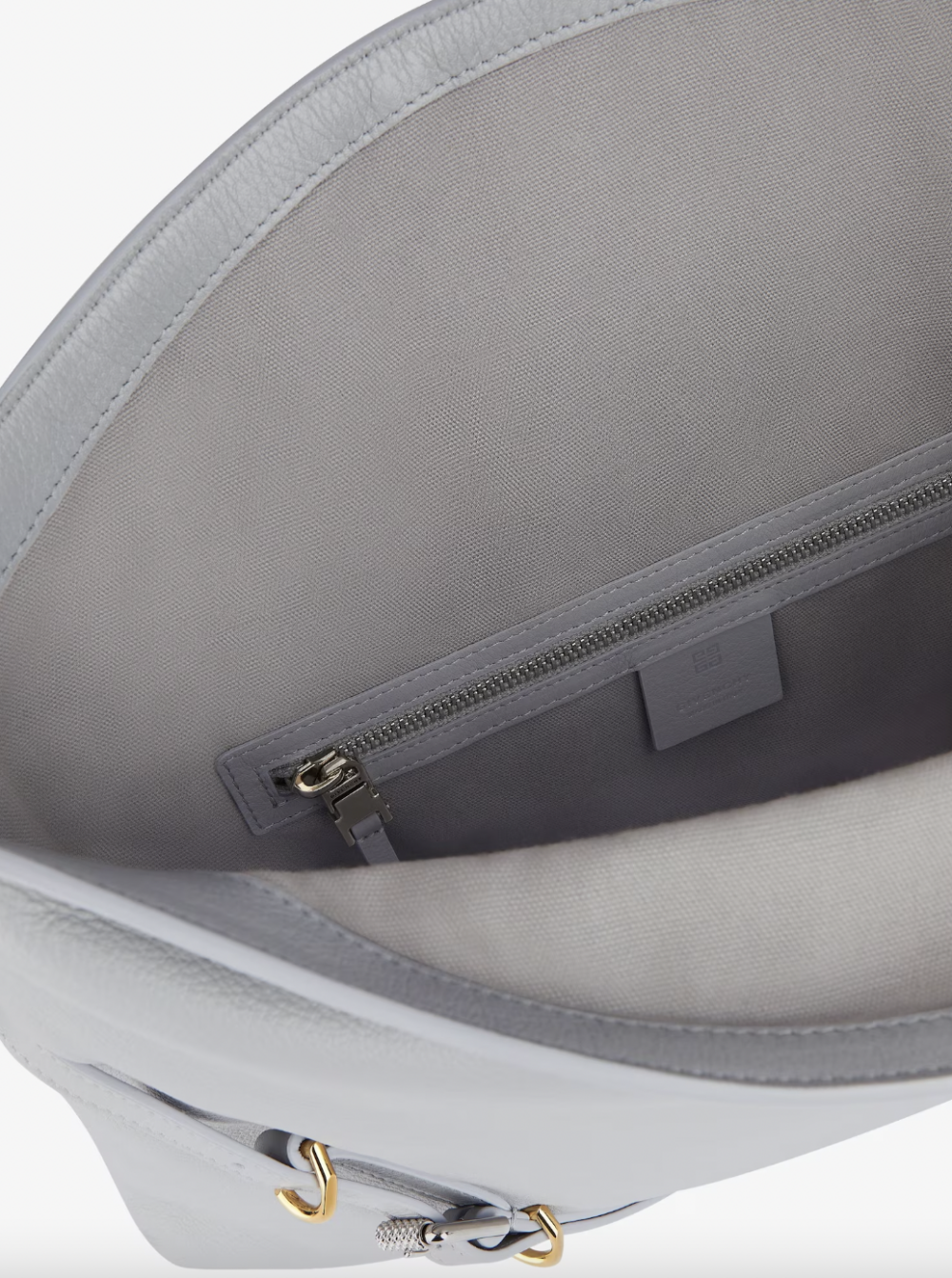 手袋內有著拉鍊的內袋。