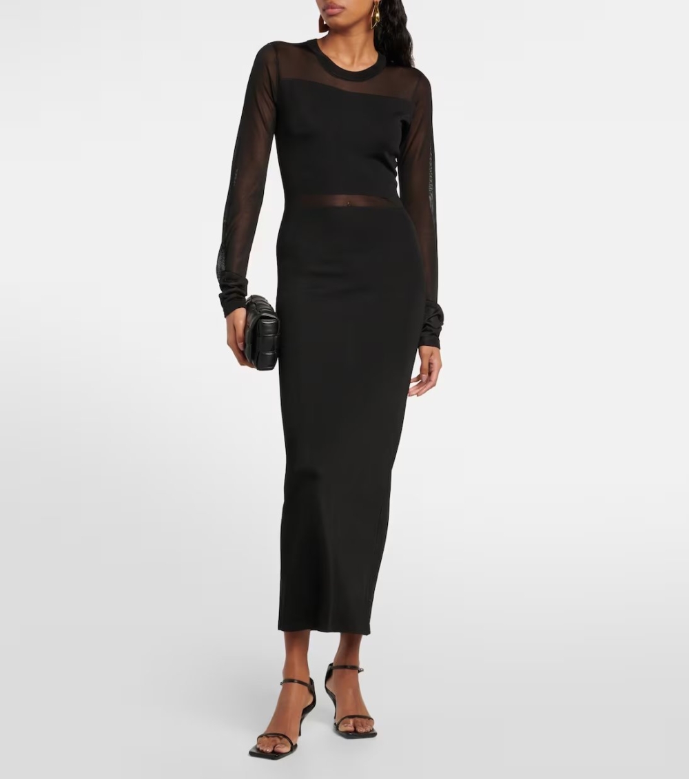 TOTEME Semi-Sheer Knitted Maxi Dress。