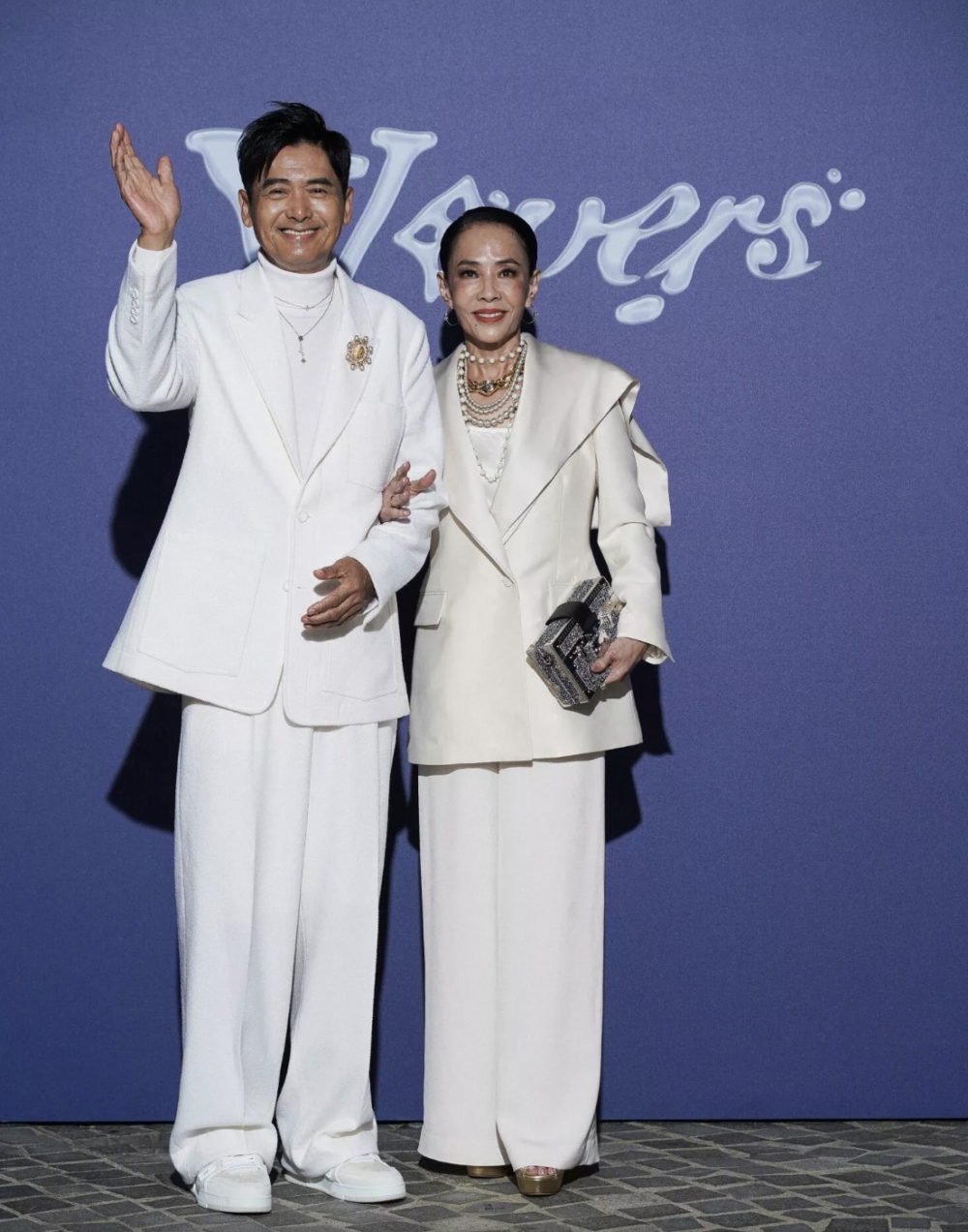 周潤發則與太太陳薈蓮一起現身