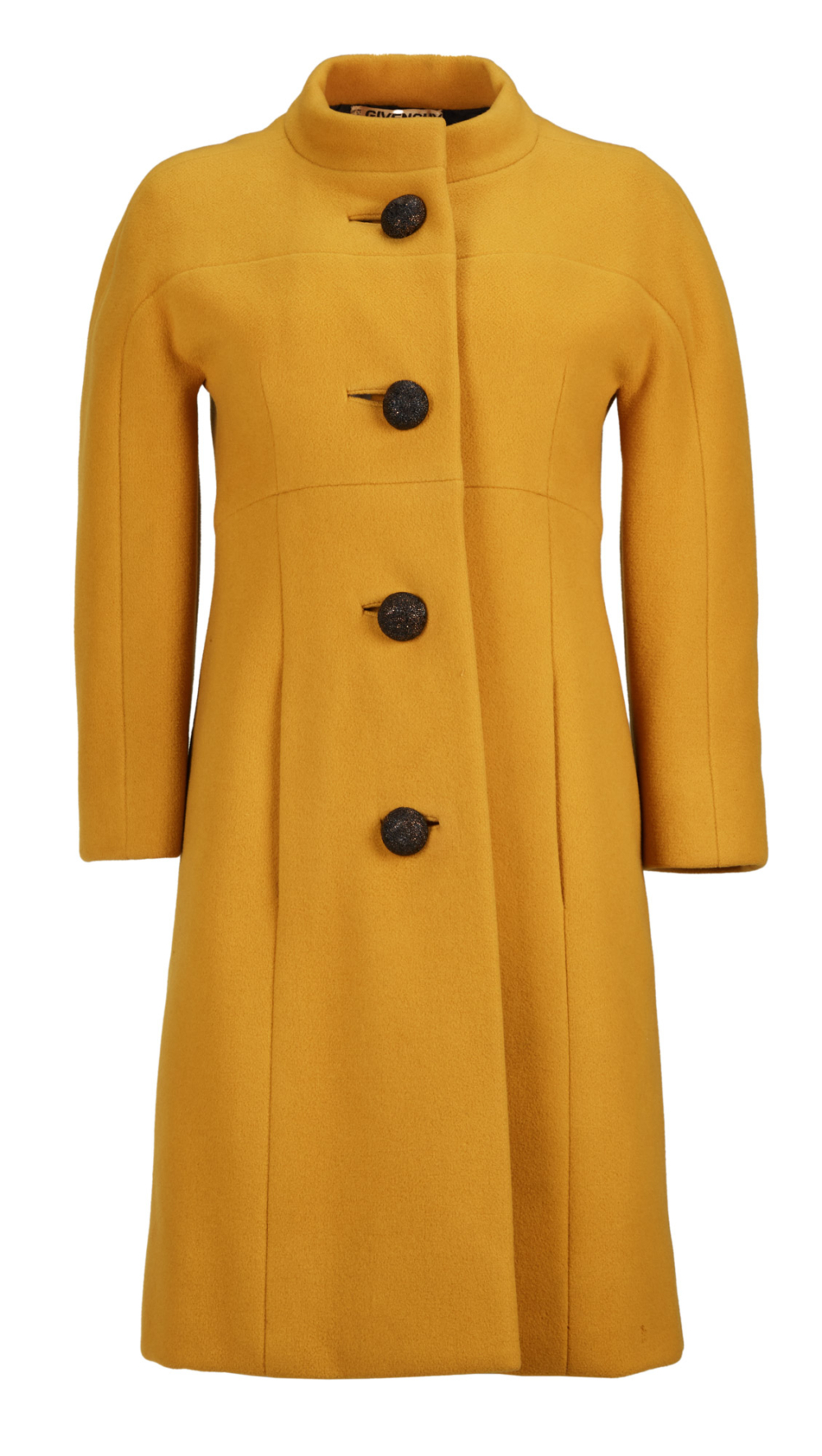 柯德莉夏萍在《Charade》電影中的Givenchy金盞花羊毛外套。