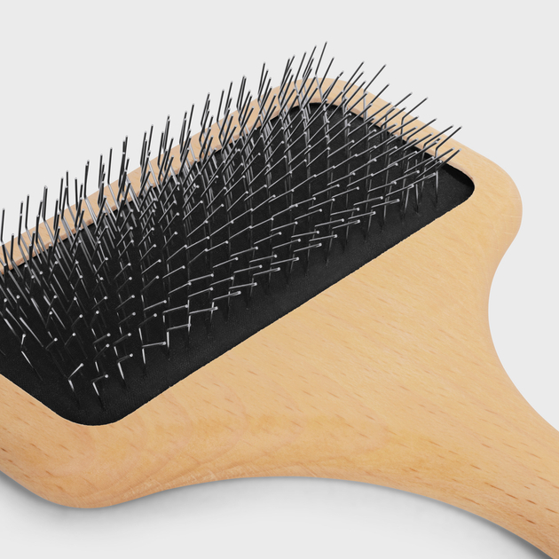 木質狗毛梳以精緻的外型設計。