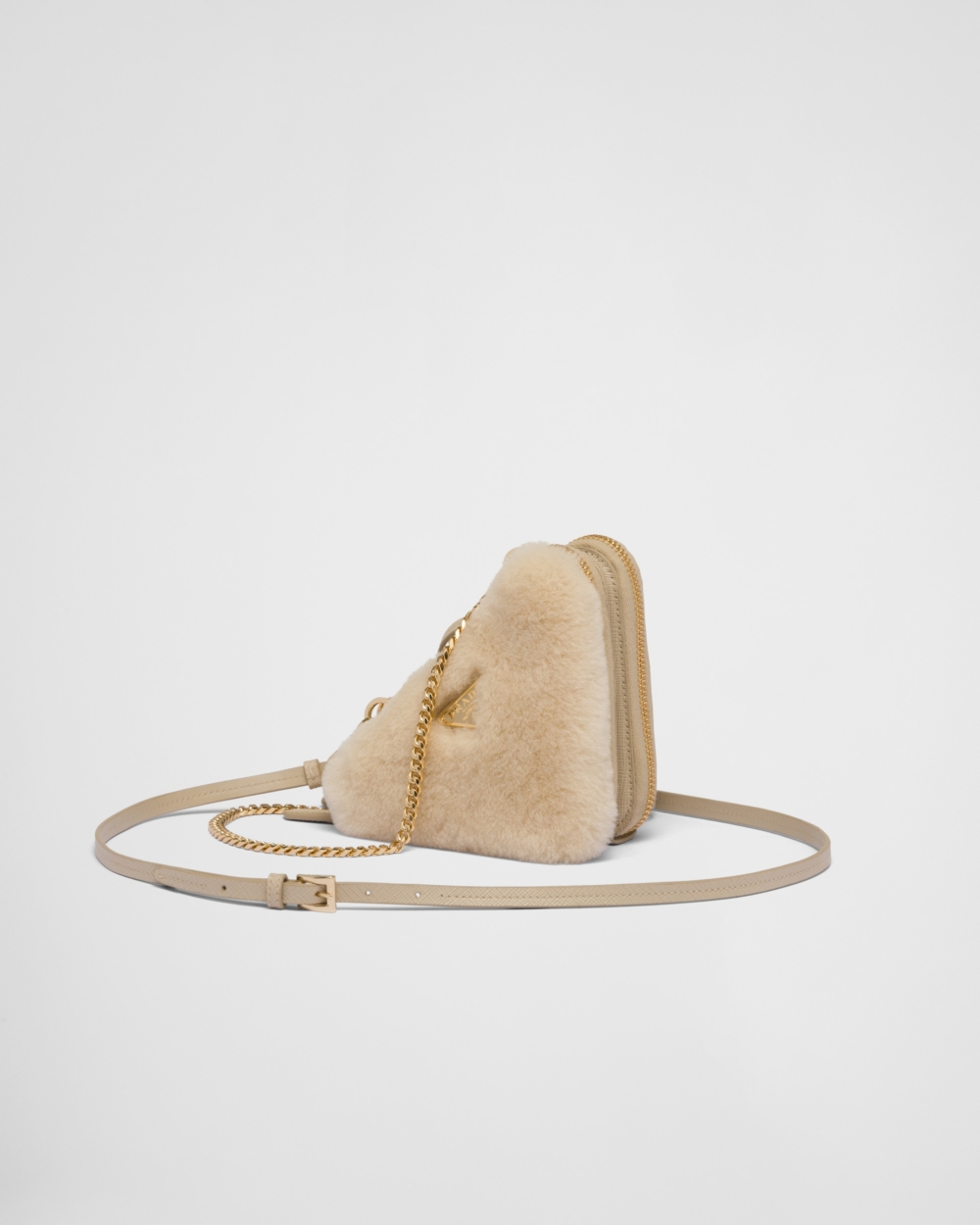 Prada Triangular shearling and Saffiano leather mini-pouch