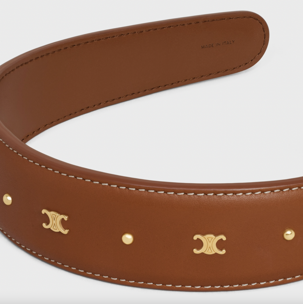 Triomphe Headband in Calfskin and Brass with Gold Finish。