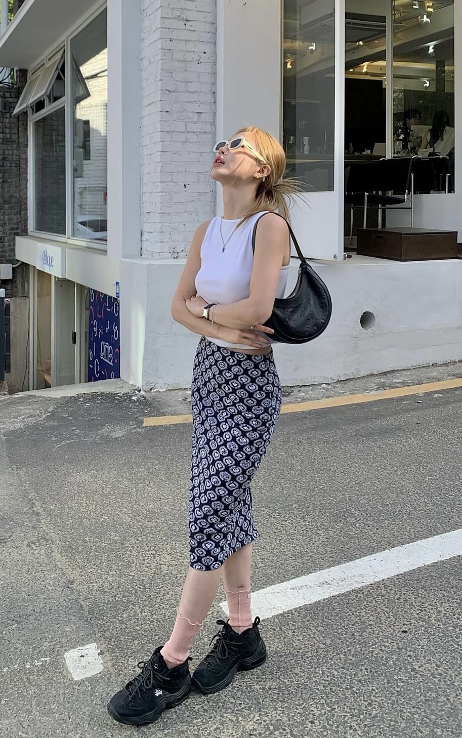背心搭配任何下身都能成為夏季街道中的亮點。