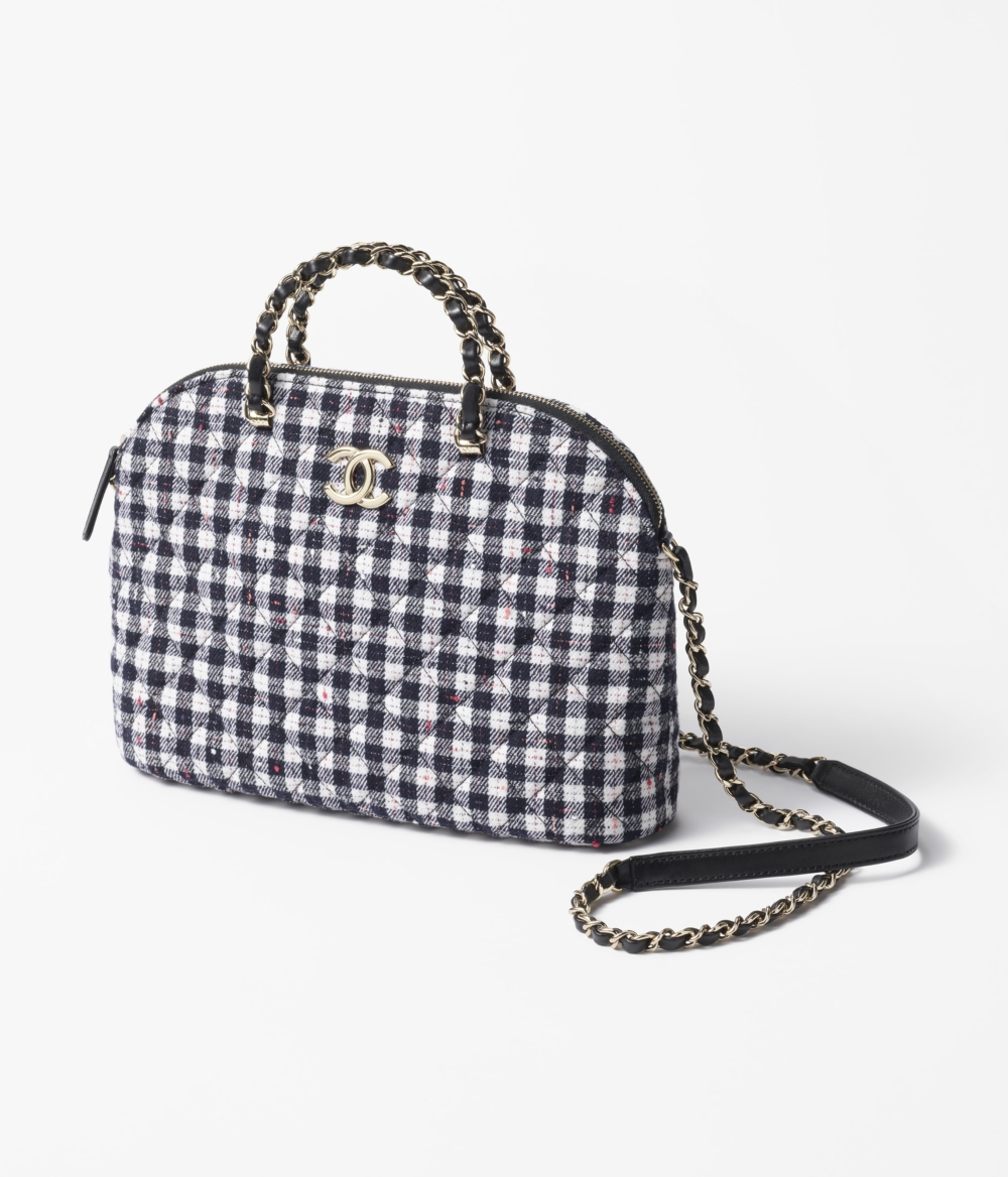 羊毛花呢和金色金屬的質感。