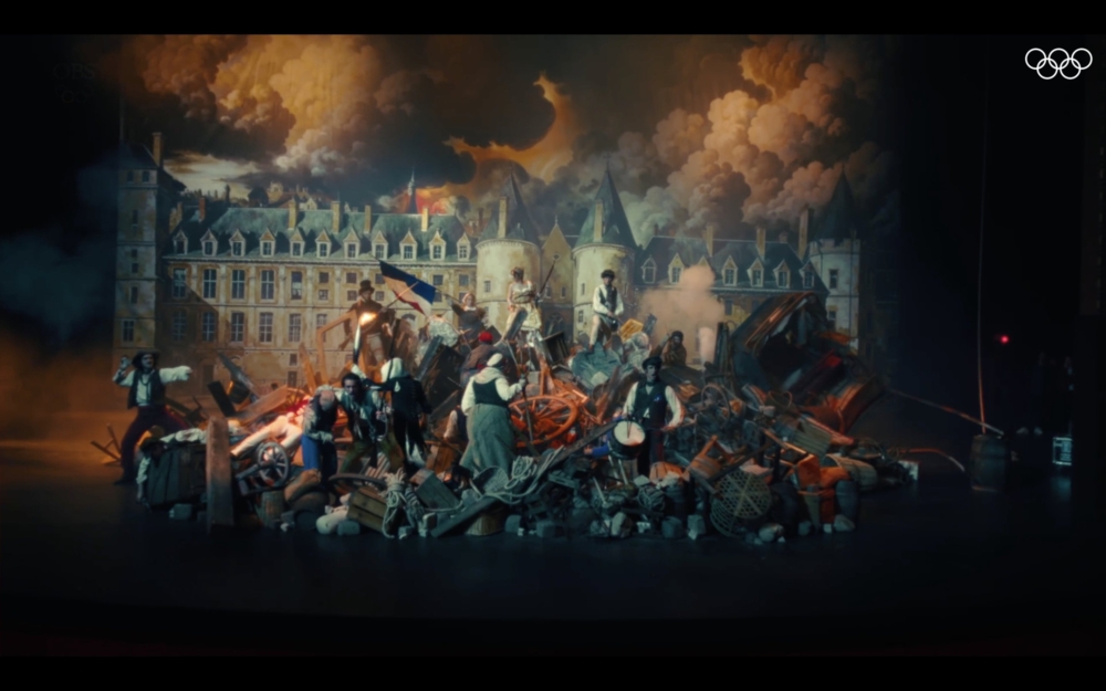 火炬手在夏特萊劇院欣賞《Les Misérables悲慘世界》的排練。Victor Hugo的小說是法國的標誌性象徵