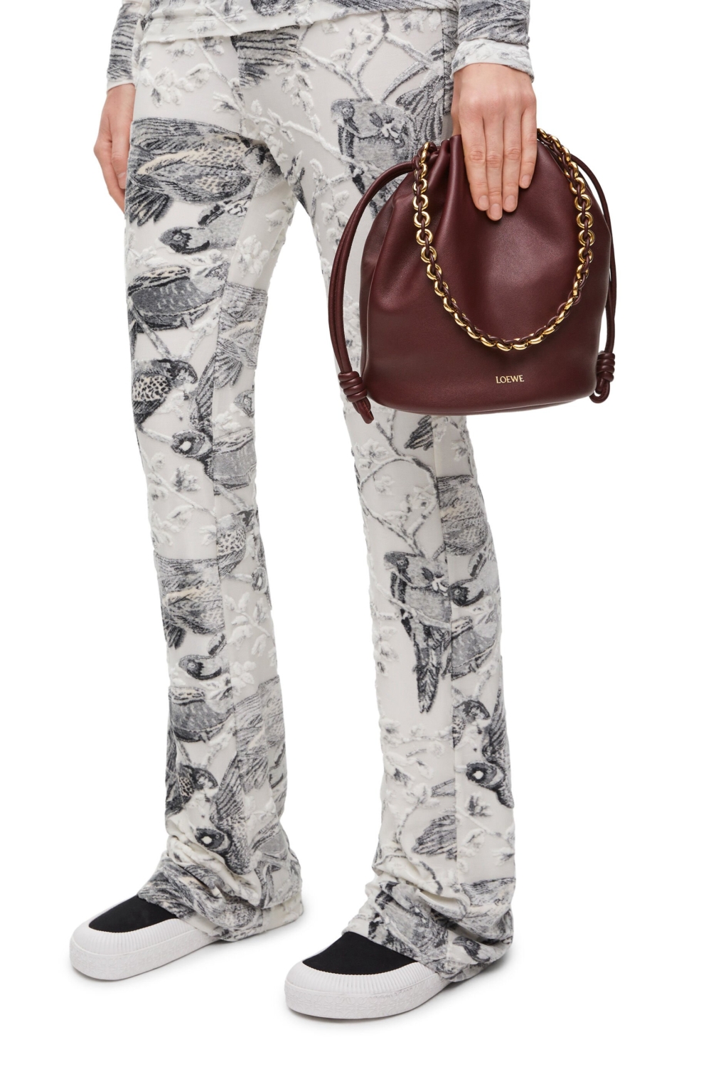 手袋配有可拆式甜甜圈鍊帶裝飾Anagram Pebble。