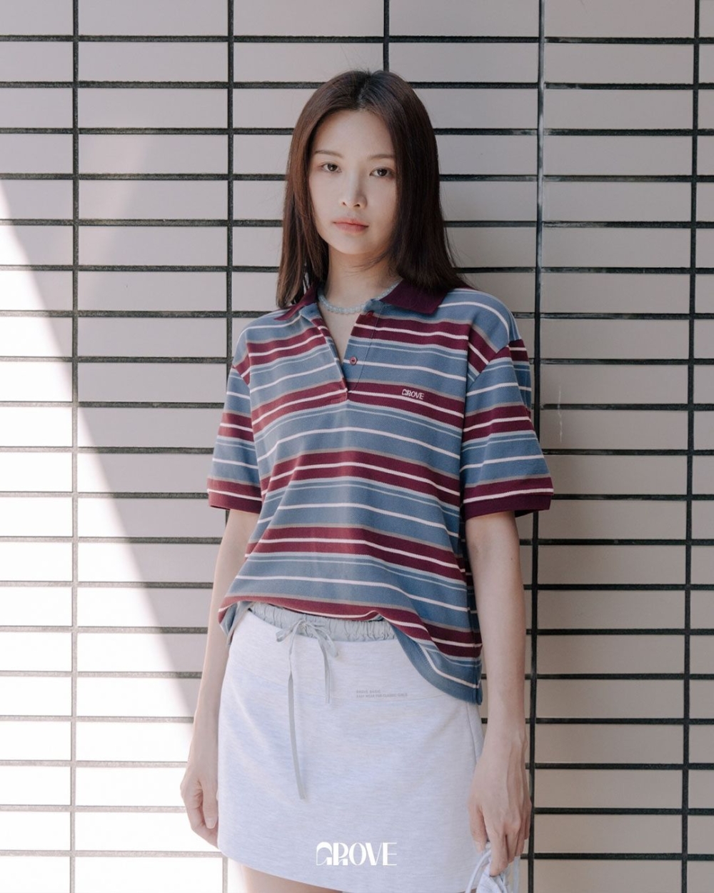 Polo Shirt搭配短裙很有Miu Miu風
