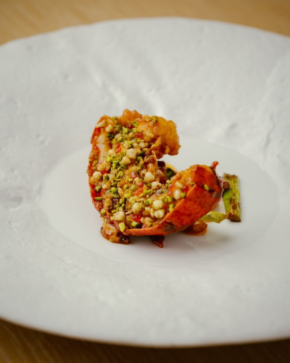 新菜式「麻辣煎龍蝦」，取材於經典港式家常菜「茄汁蝦碌」