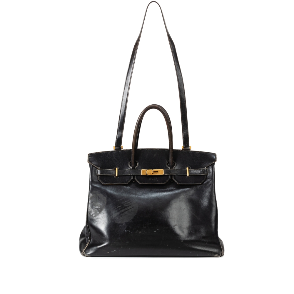 Jane Birkin這款原型手袋配有固定的肩帶